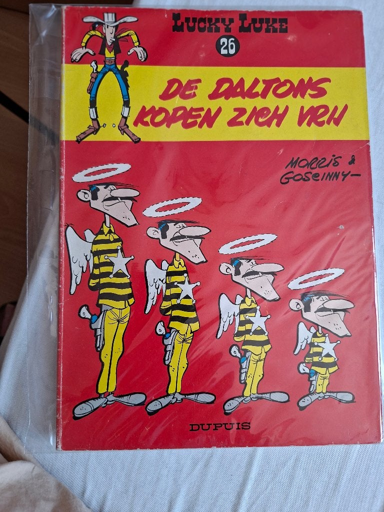 Lucky Luke 26, de Daltons kopen zich vrij, Eén stripboek, Ophalen of Verzenden, Gelezen
