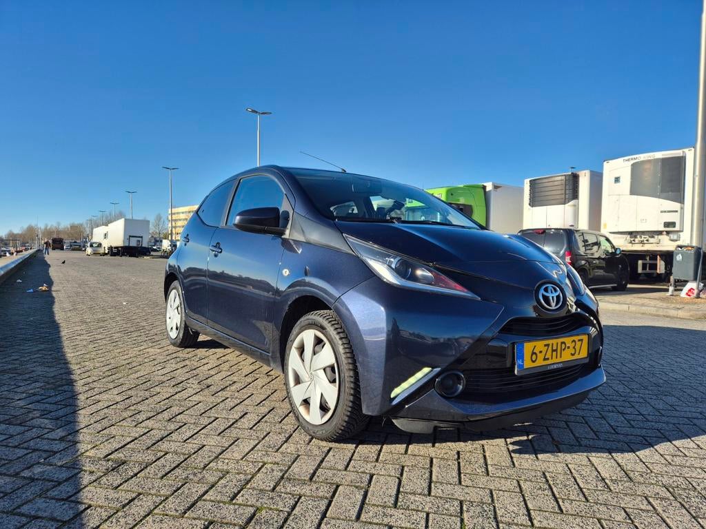 Toyota Aygo 1.0 12V Vvt-i Ddrs 2015 Blauw, Voorwielaandrijving, Stof, Zwart, Origineel Nederlands
