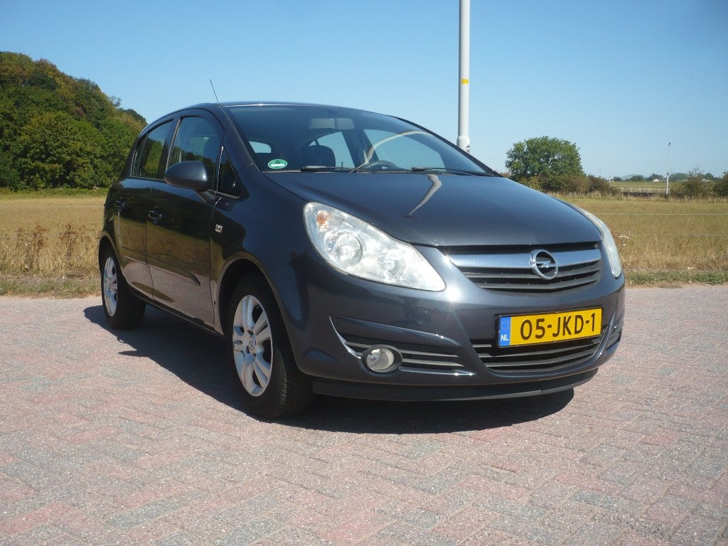 Opel Corsa 1.2 16V Enjoy 5DRS AIRCO 2009 143263 km NAP, Voorwielaandrijving, Stof, 4 cilinders, Metallic lak