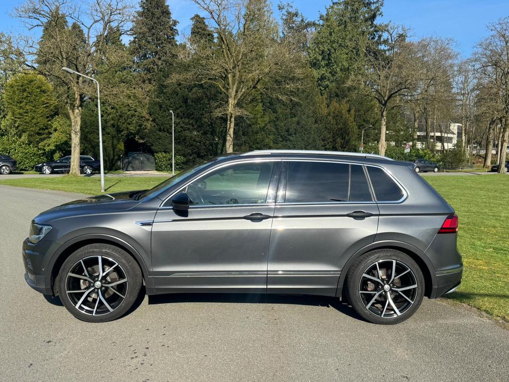 Volkswagen Tiguan 1.5 TSI 160pk2019 Grijs Dealer historie, Auto's, Voorwielaandrijving, Stof, Euro 6, 4 cilinders