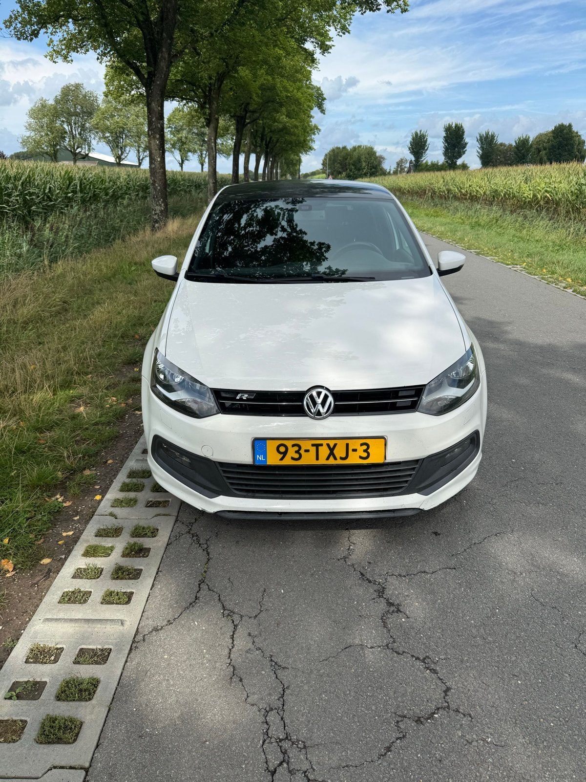 Volkswagen Polo 1.2 TSI 77KW 2012 Wit, Auto's, Voorwielaandrijving, Stof, 40 €/maand, Zwart