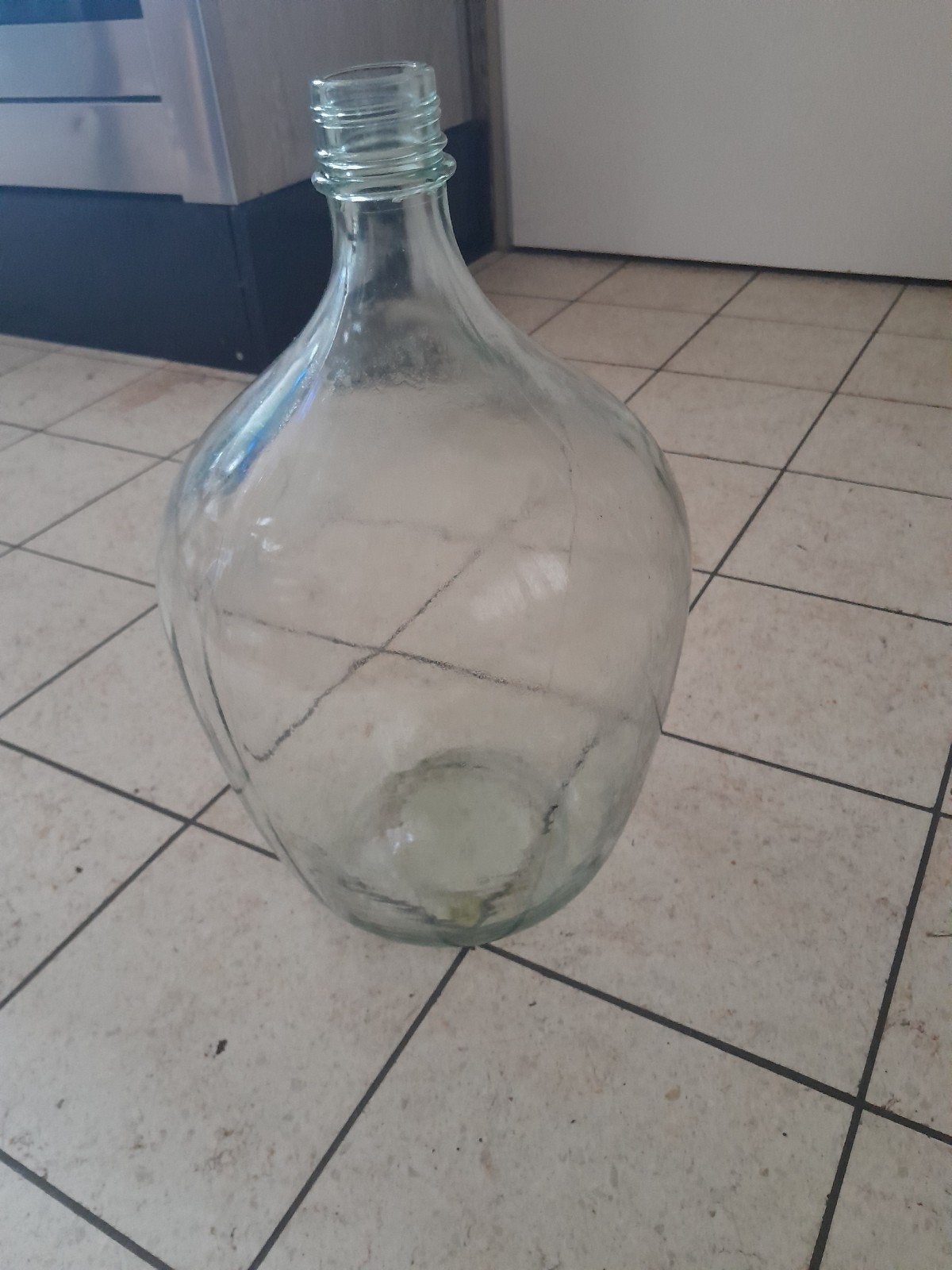 Grote glazen fles / mandfles / gistfles, Ophalen