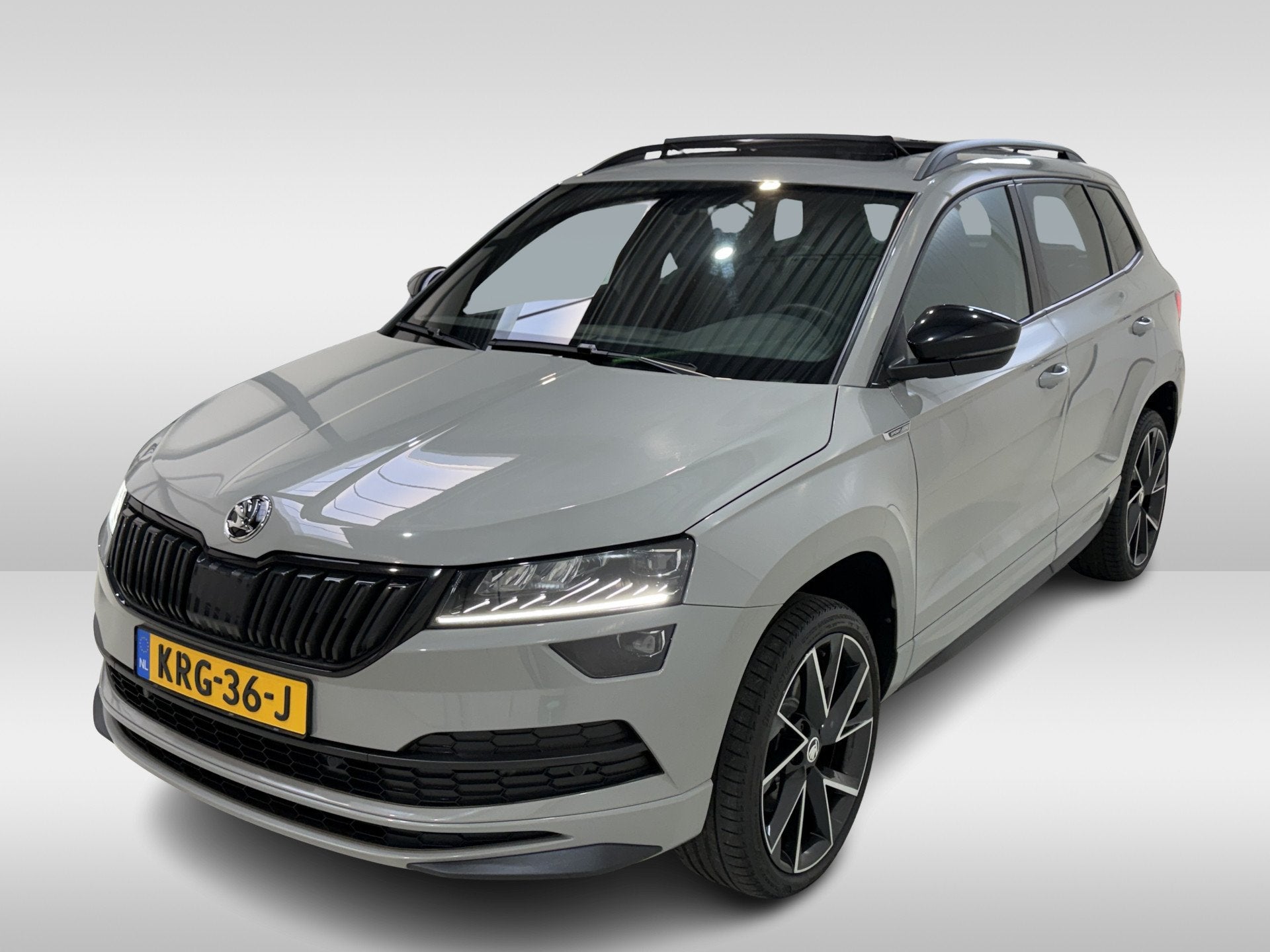 Skoda Karoq 1.5 TSI 150pk ACT DSG Sportline | Pano dak | Acc, Auto's, Dealer onderhouden, Stof, Euro 6, 4 cilinders