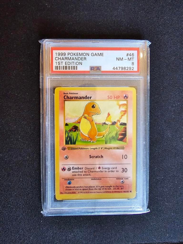 1999 Charmander 46/102 Base Set 1st edition shadowless PSA8, Hobby en Vrije tijd, Ophalen of Verzenden, Zo goed als nieuw, Losse kaart