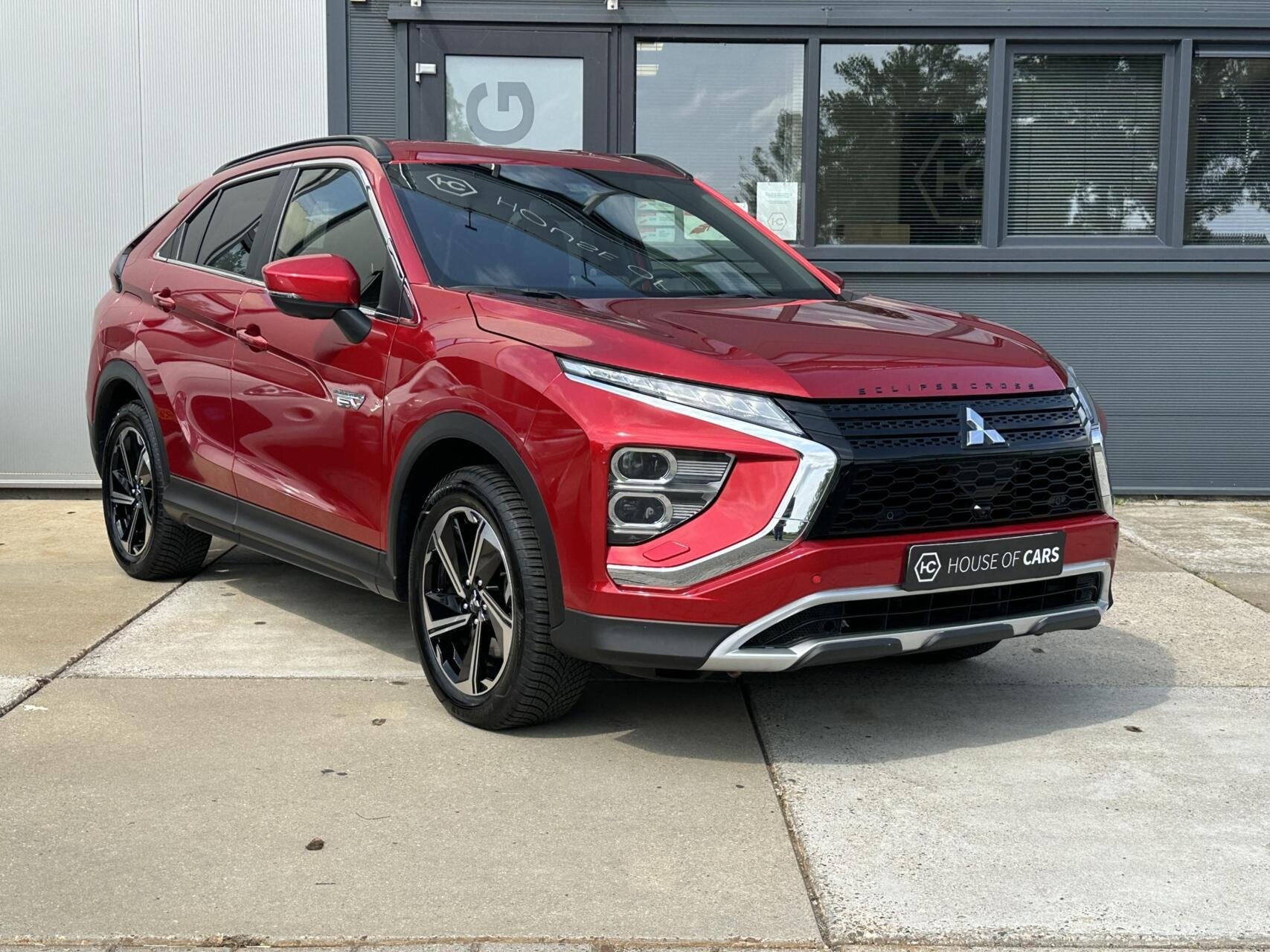 Mitsubishi Eclipse Cross 2.4 PHEV Intense+ Automaat Trekhaak, Auto's, Mitsubishi, Automaat, 188 pk, 4 cilinders, Leder en Stof