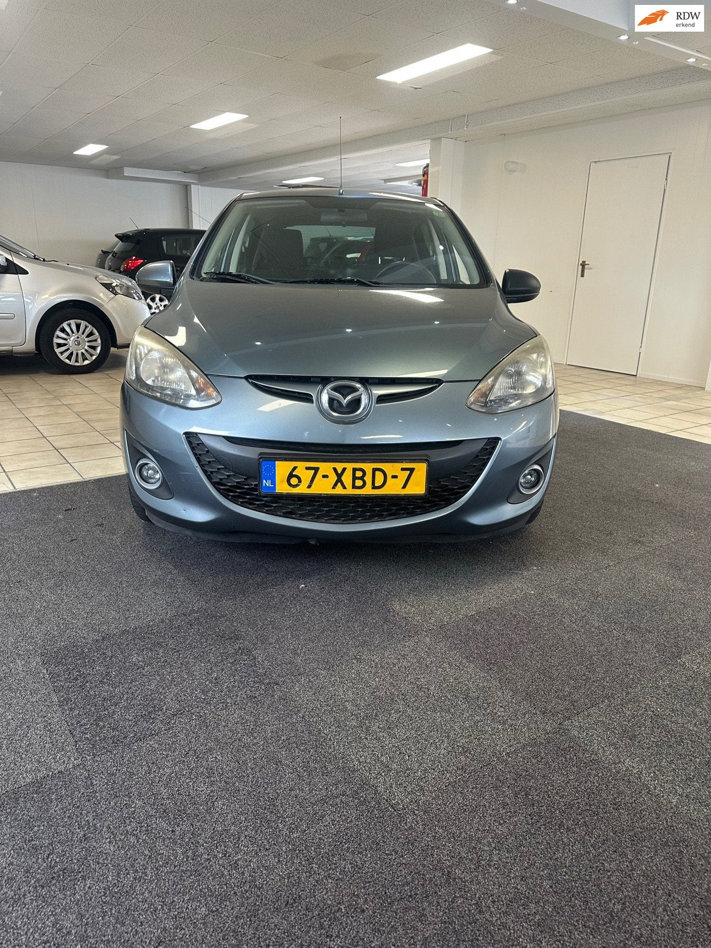 Mazda 2 1.3 BIFUEL Navigator GT.1de eigenaar.Airco, Auto's, Mazda, Voorwielaandrijving, Euro 5, 4 cilinders, 4 stoelen