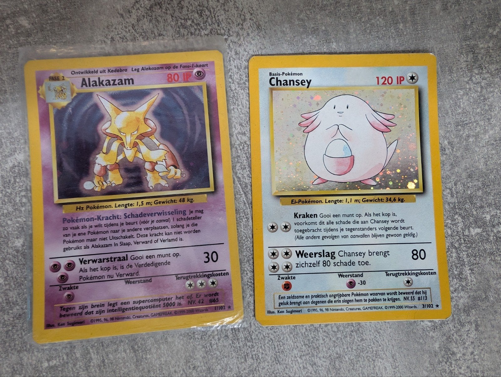 Pokémon Alakazam 1/102 en Chansey 3/102 Nederlands, Ophalen of Verzenden, Gebruikt, Meerdere kaarten