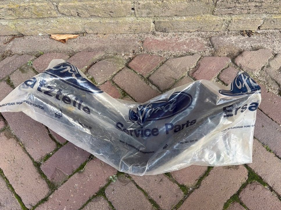 Ford Escort MK4 RS2000 Achterbumperlip linkerzijde nieuw, Nieuw, Ophalen of Verzenden, Ford, Bumper