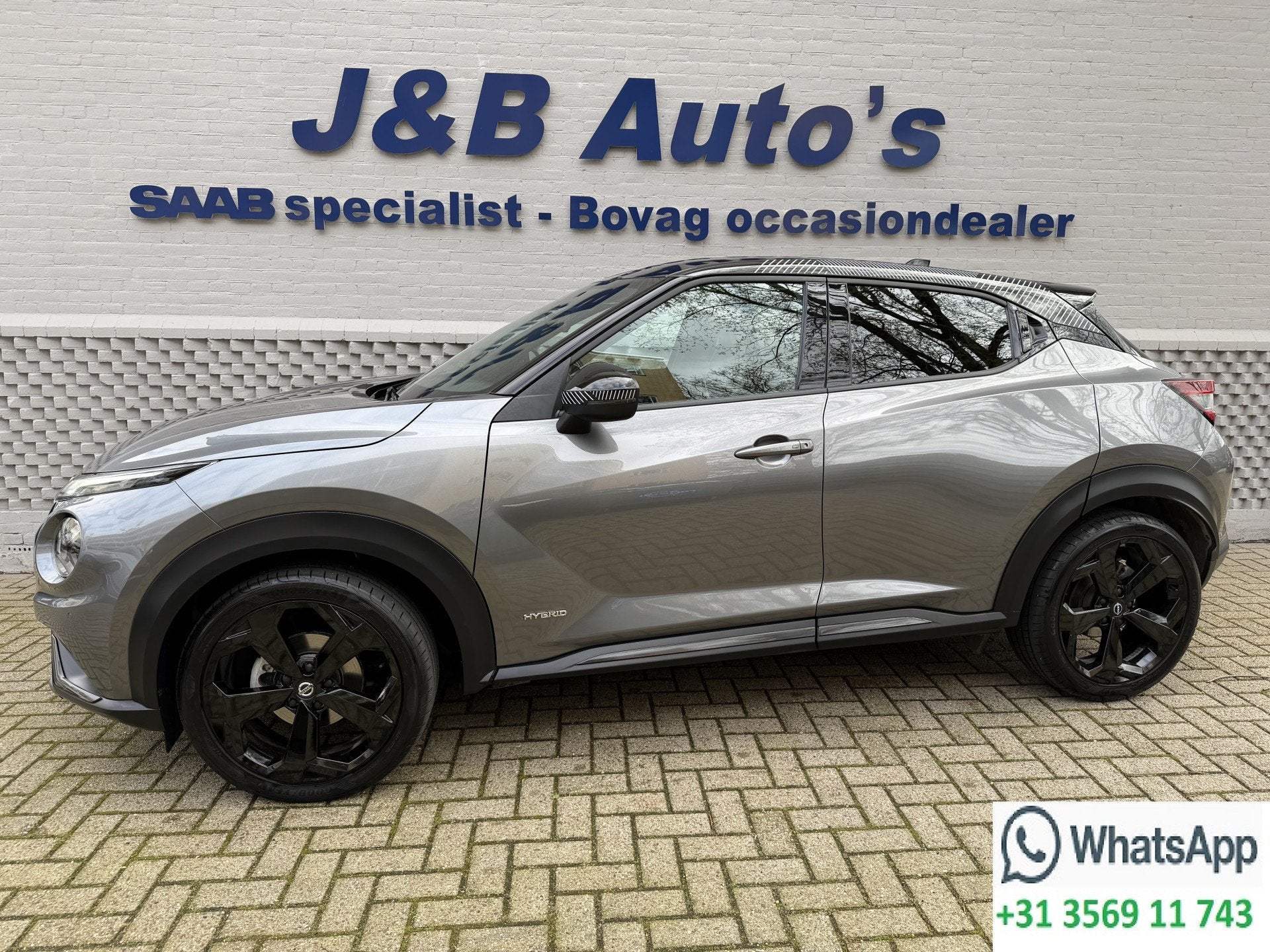 Nissan Juke 1.6 Hybrid Premiere Edition Stoelverwarming Navi, Auto's, 1300 kg, Gebruikt, Leder, Bedrijf