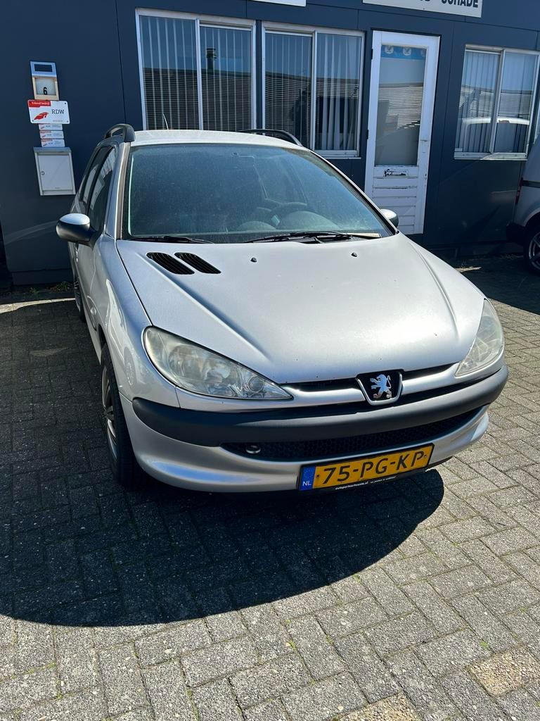 Peugeot 206 1.4 SW XS 2004 Grijs, Auto's, Voorwielaandrijving, Stof, 4 cilinders, Origineel Nederlands