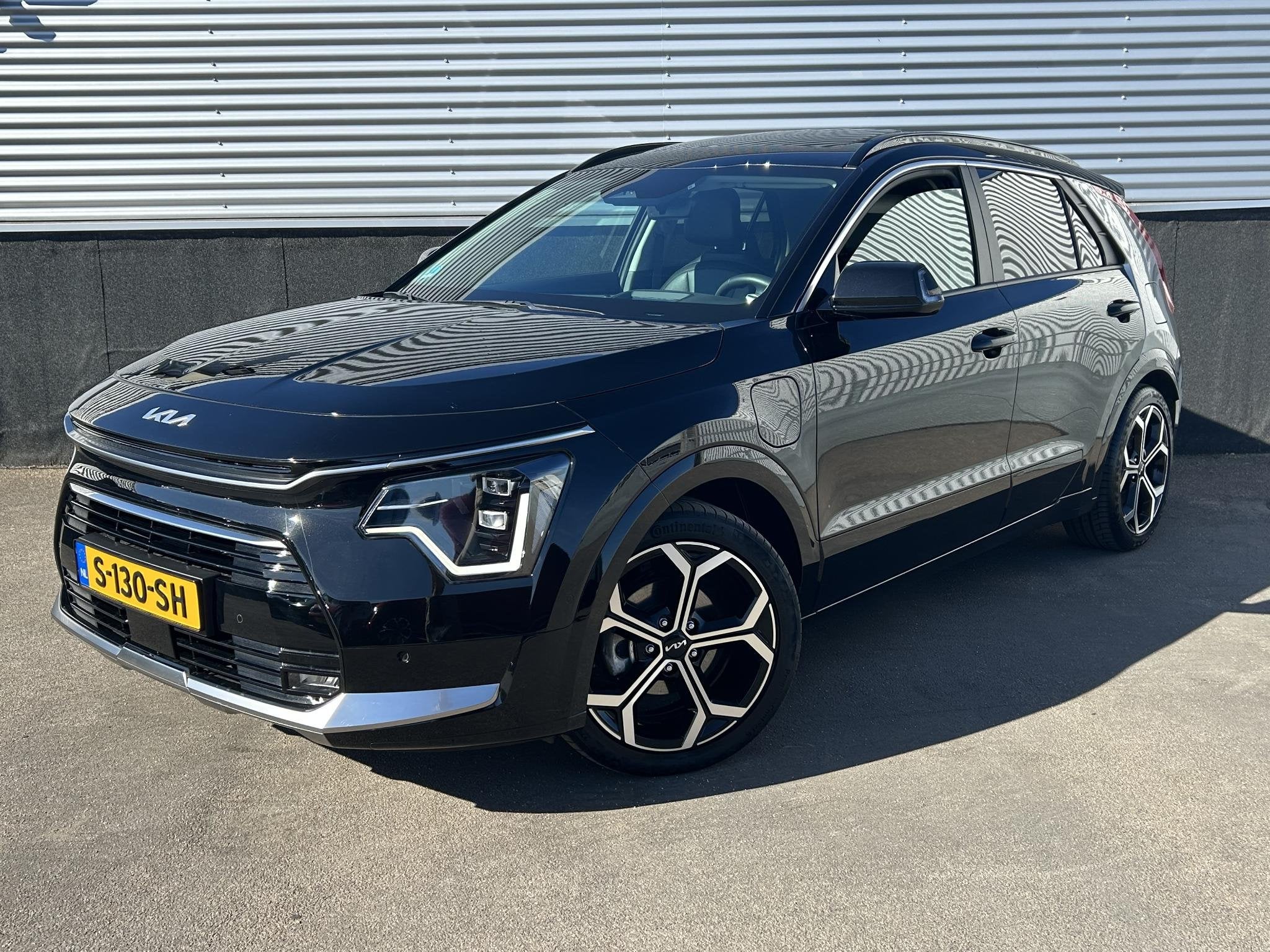 Kia Niro 1.6 GDi PHEV ExecutiveLine Schuif/kanteldak, Trekha, Auto's, Dealer onderhouden, Gebruikt, Euro 6, Zwart