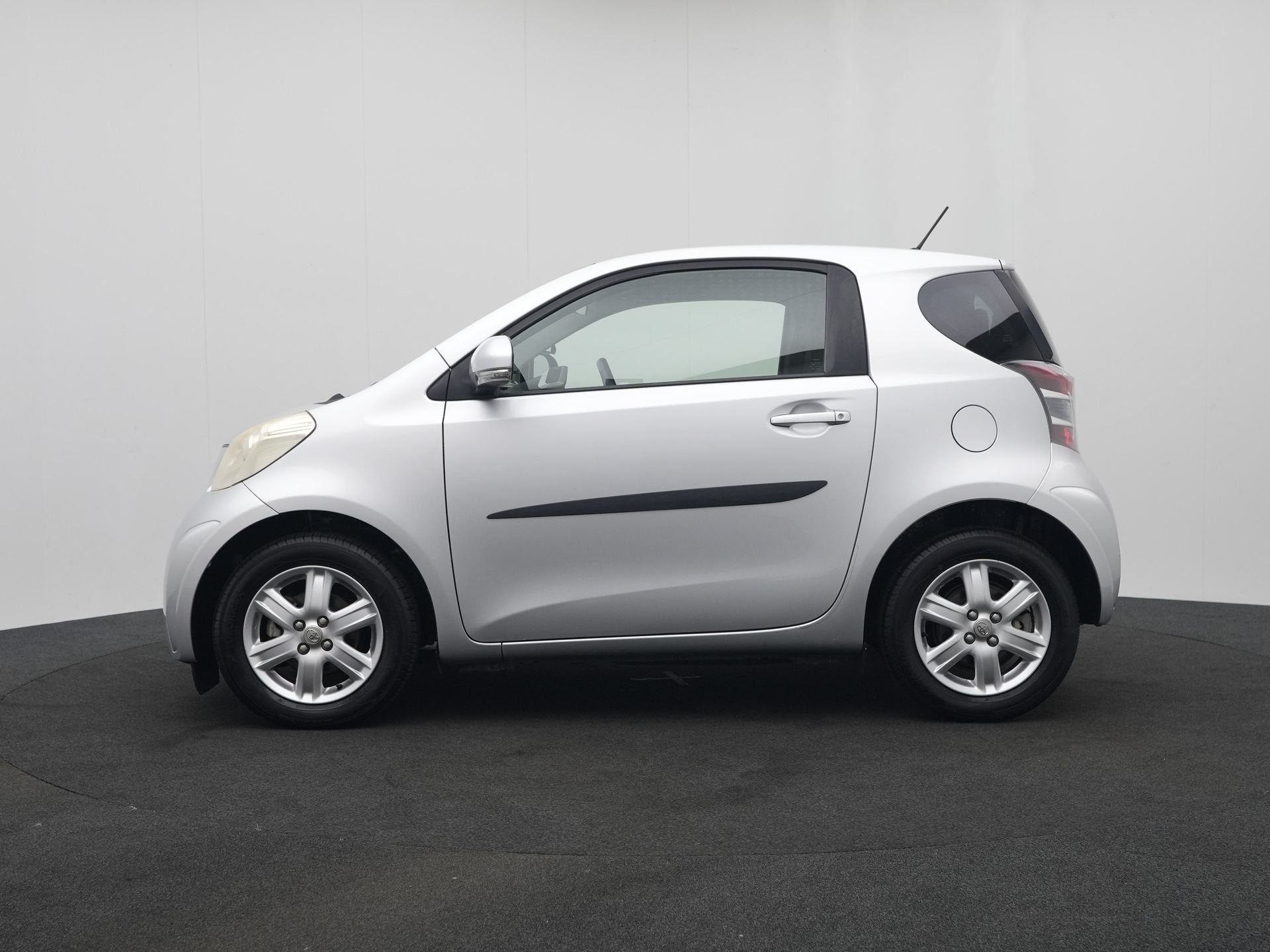 Toyota iQ 1.0 VVTi Comfort | Airco | Elektrische ramen |, 12 maanden, Stof, Gebruikt, 4 stoelen