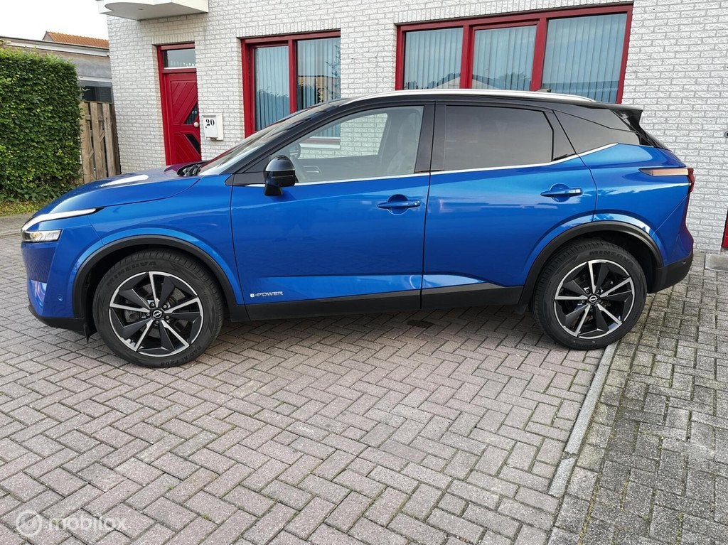 Nissan Qashqai 1.5 e-Power Tekna PANODAK/LEER/360CAM, Auto's, Nissan, 1497 cc, Gebruikt, Zwart, Blauw
