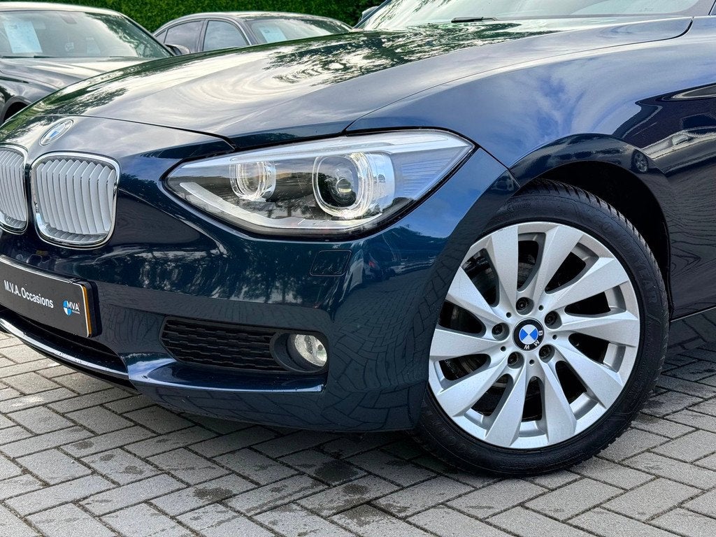 BMW 1-serie 116i Business+ Sport|Nieuwe Ketting + Klepseals|, Auto's, BMW, 1-Serie, Euro 5, Gebruikt, Zwart