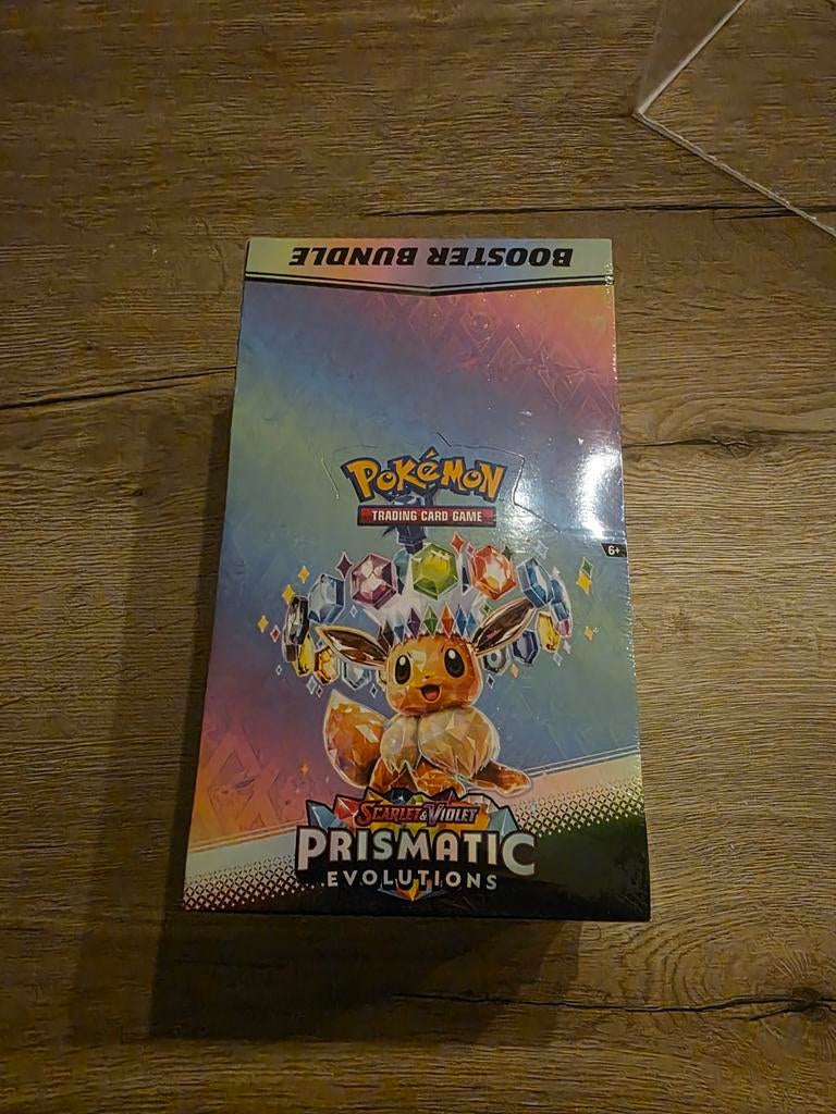 Prismatic  Evolutions Booster Bundle Display Box , Spelcomputers en Games, Games | Atari, Zo goed als nieuw, Overige modellen