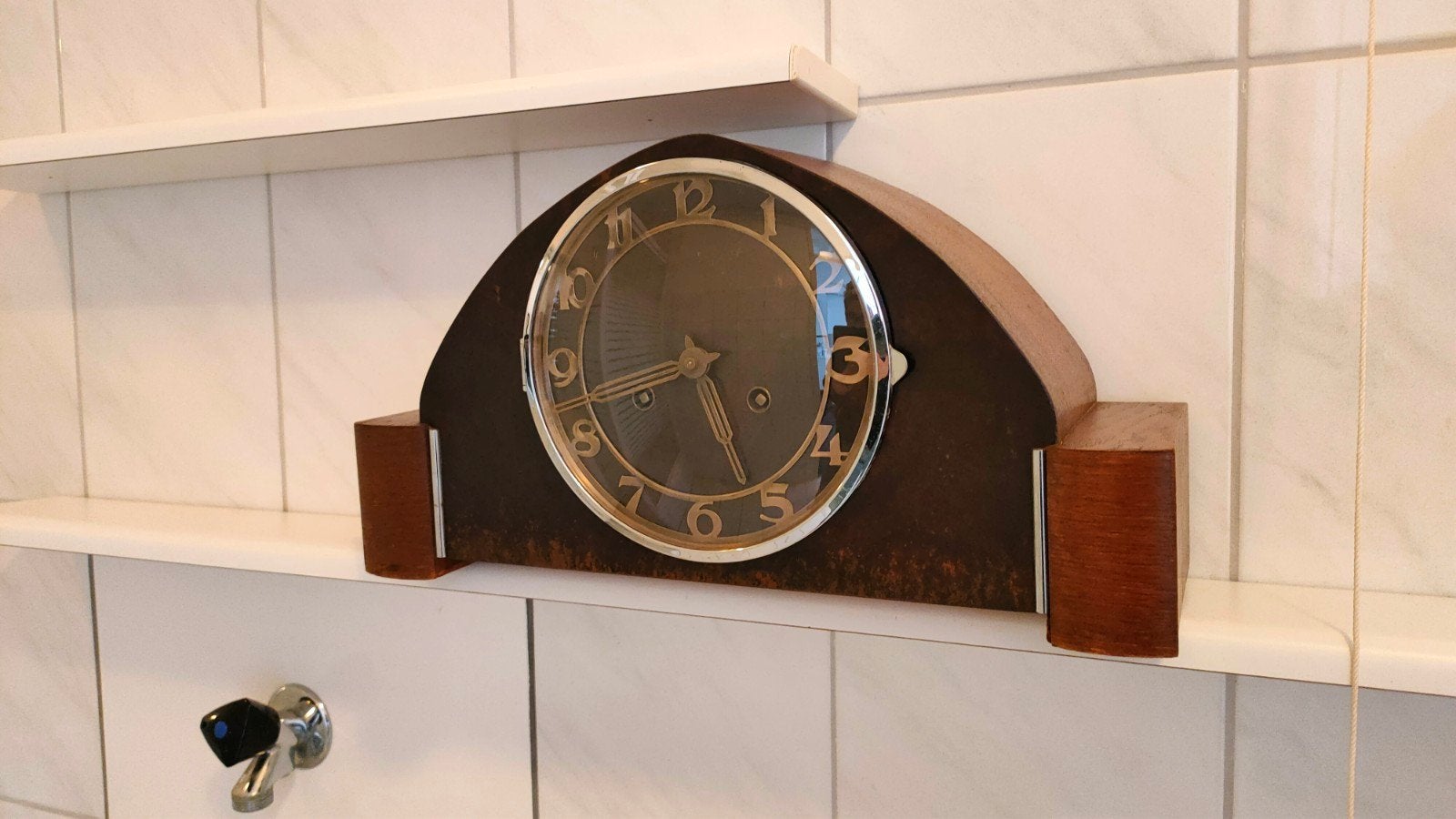 Antieke pendule klok, Ophalen