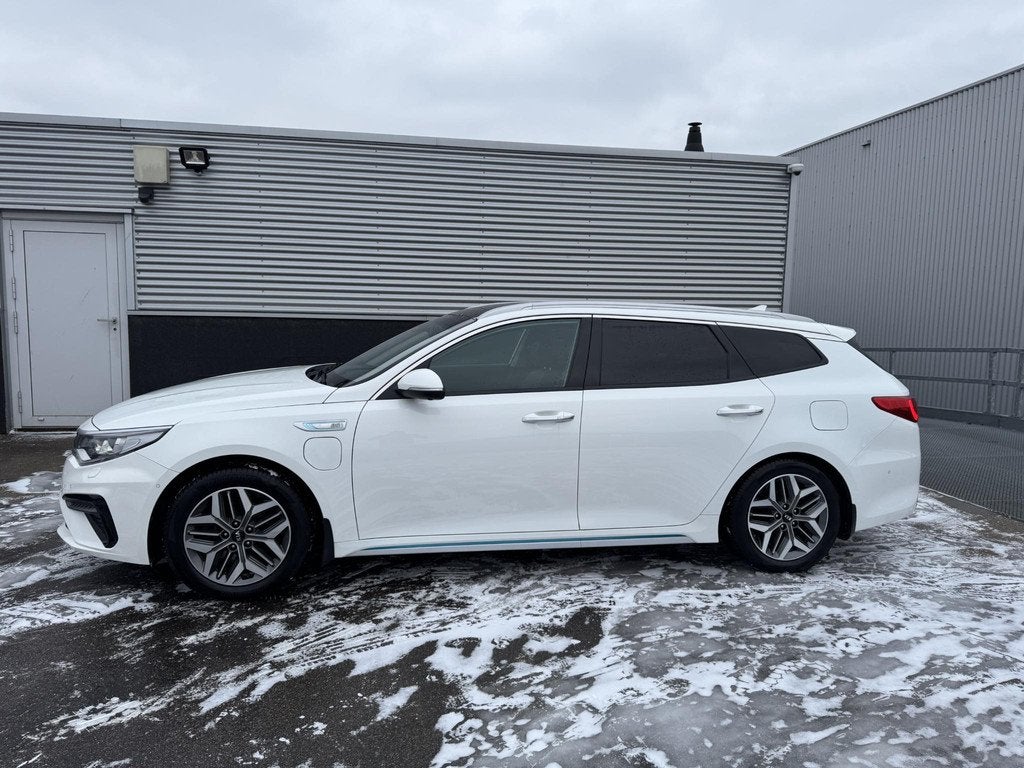 Kia Optima Sportswagon 2.0 GDI PHEV ExecutiveLine Schuif/kan, Auto's, Gebruikt, Euro 6, Wit, Hybride Elektrisch/Benzine