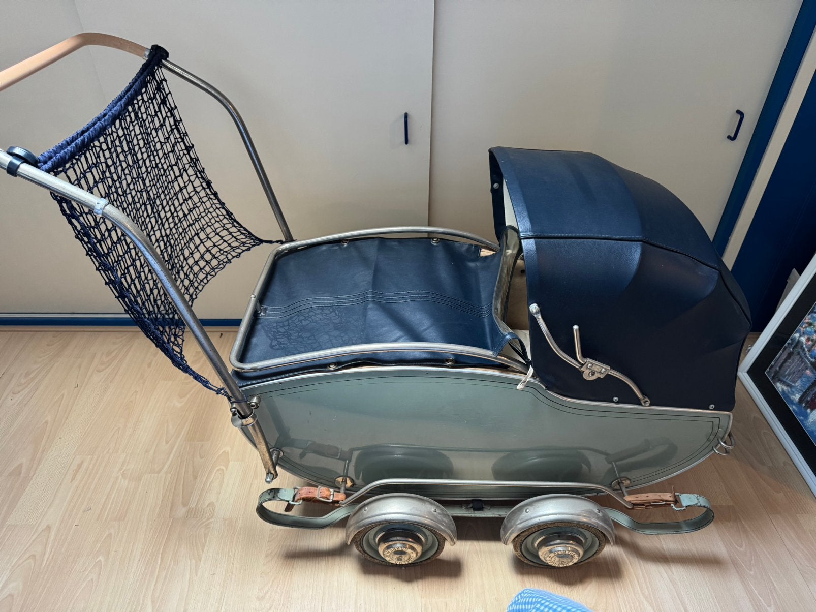 Een mooie vintage kinderwagen, Ophalen