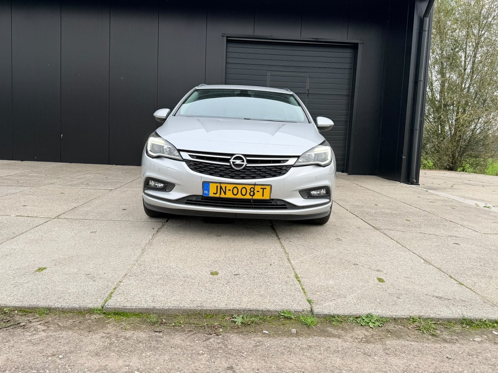 Opel Astra 1.0 Turbo 77KW Sports Tourer 2016 Grijs, Auto's, Voorwielaandrijving, 1178 kg, 620 kg, Origineel Nederlands
