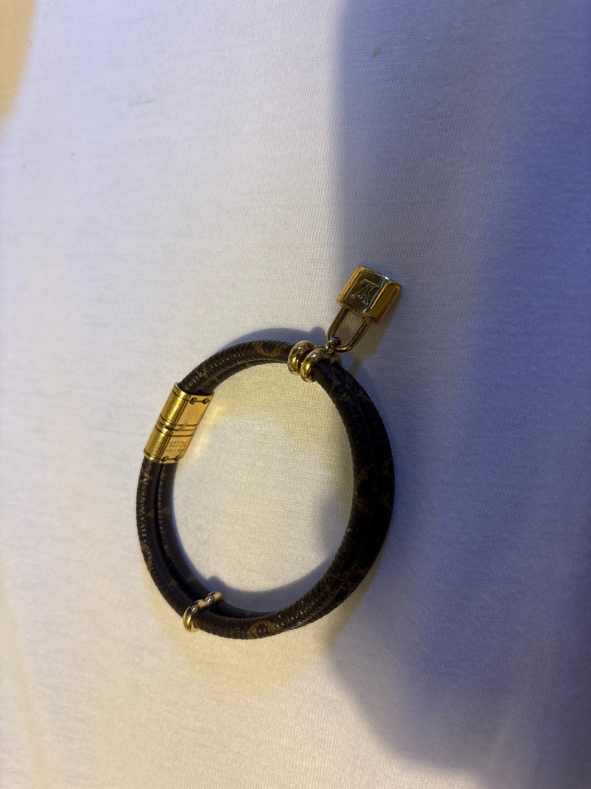 Originele Louis Vuitton armbandje, Ophalen of Verzenden, Gebruikt, Bruin, Leer
