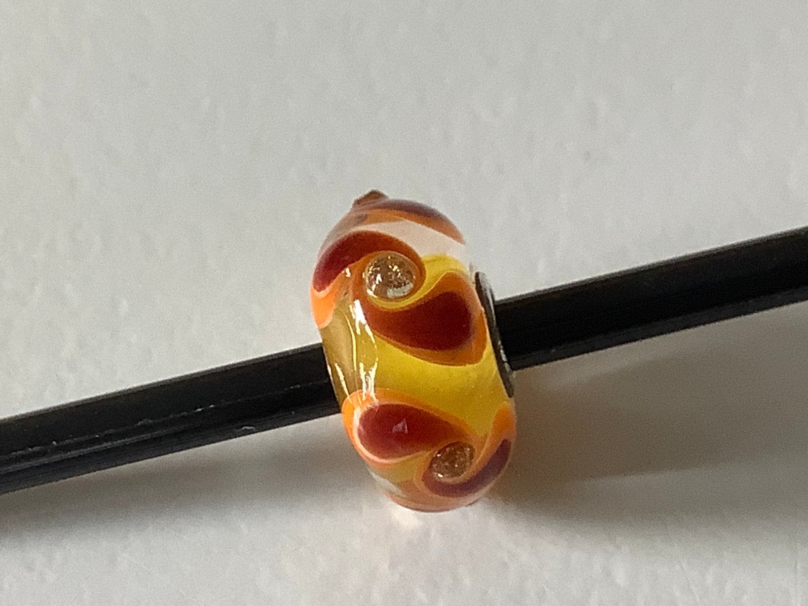 Trollbead uniekje in mooie warme kleuren en gouden glitter., Sieraden, Tassen en Uiterlijk, Ophalen of Verzenden, Zo goed als nieuw
