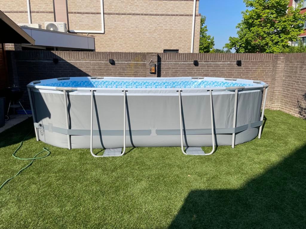 Bestway ovaal zwembad met zandfilterpomp en verwarming, Ophalen, Gebruikt, 80 tot 120 cm, 300 cm of meer
