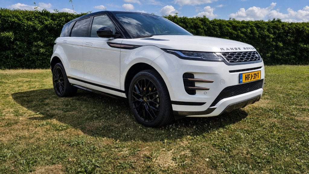 Land Rover Range Rover Evoque '23 P300e R-Dynamic SE 309 pk, Auto's, Automaat, 1498 cc, Zwart, Wit