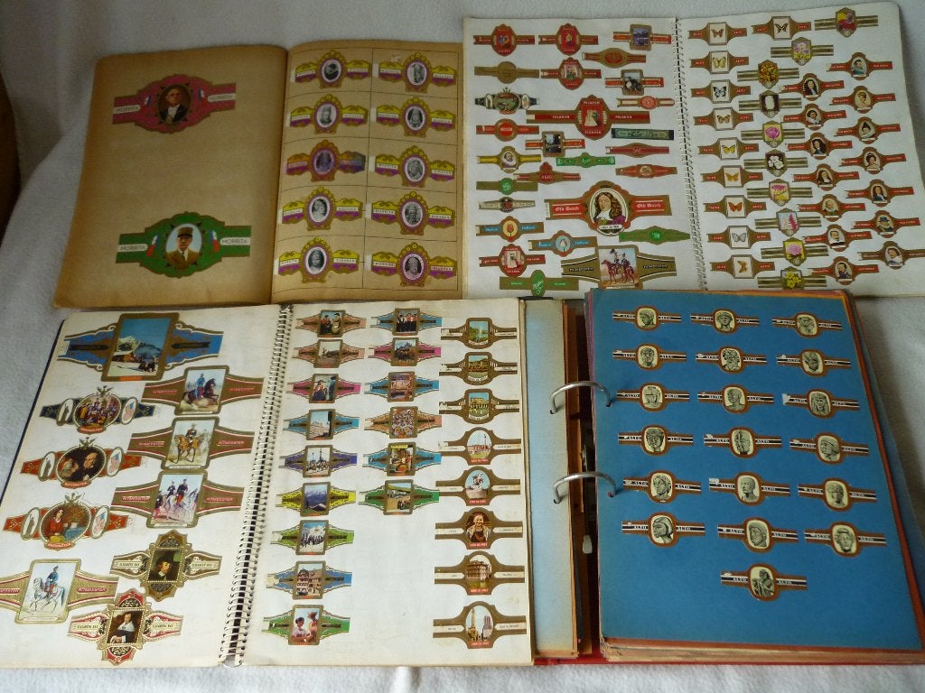 Grote verzameling sigarenbandjes plakboek en ordner vol, Ophalen of Verzenden, Gebruikt, Sigarenbandjes