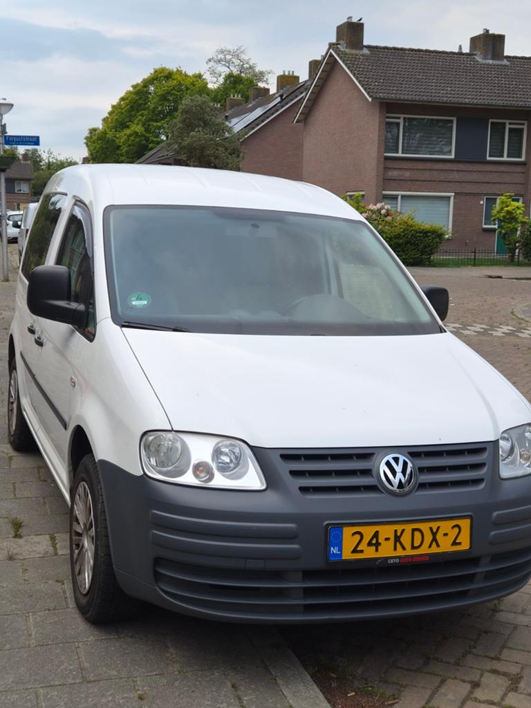 Volkswagen Caddy 1.9 TDI 77KW Combi DSG 2009 Wit automaat, Auto's, Bestelauto's, Euro 5, 4 cilinders, USB, Volkswagen