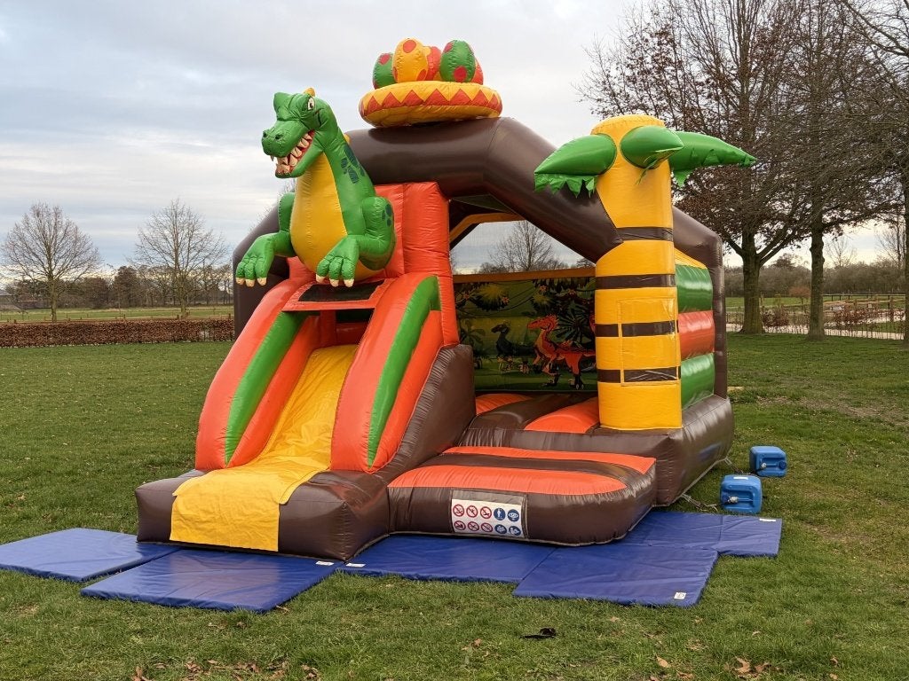 Springkussen Dino te huur €90,-, Ophalen, Zo goed als nieuw, Overige
