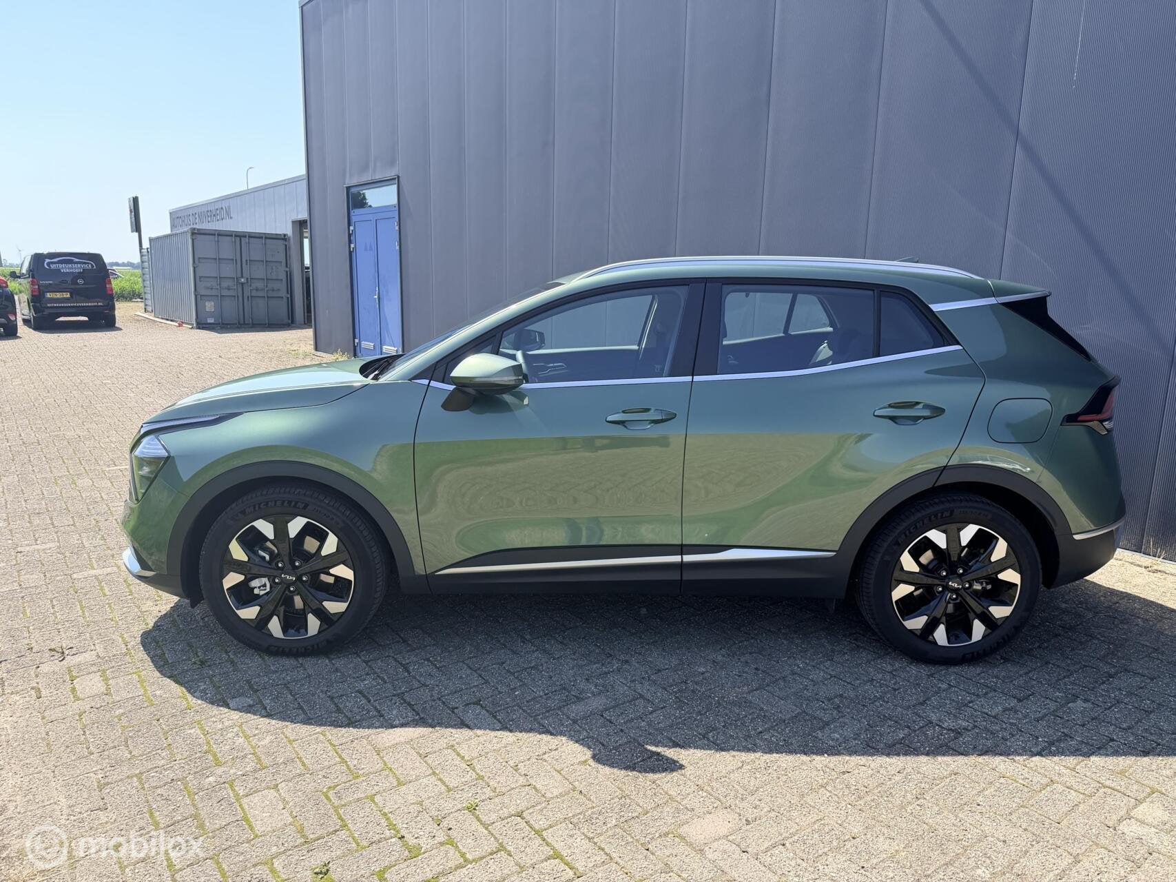 Kia Sportage 1.6 T-GDi Plug-in Hybrid AWD DynamicLine|trekha, Auto's, Automaat, 12 maanden, Stof, Gebruikt
