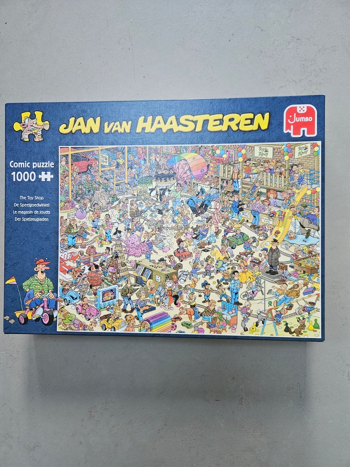 Jan Haasteren Comic Puzzel - De Speelgoedwinkel 1000 stuk, Ophalen of Verzenden, 500 t/m 1500 stukjes, Zo goed als nieuw, Legpuzzel