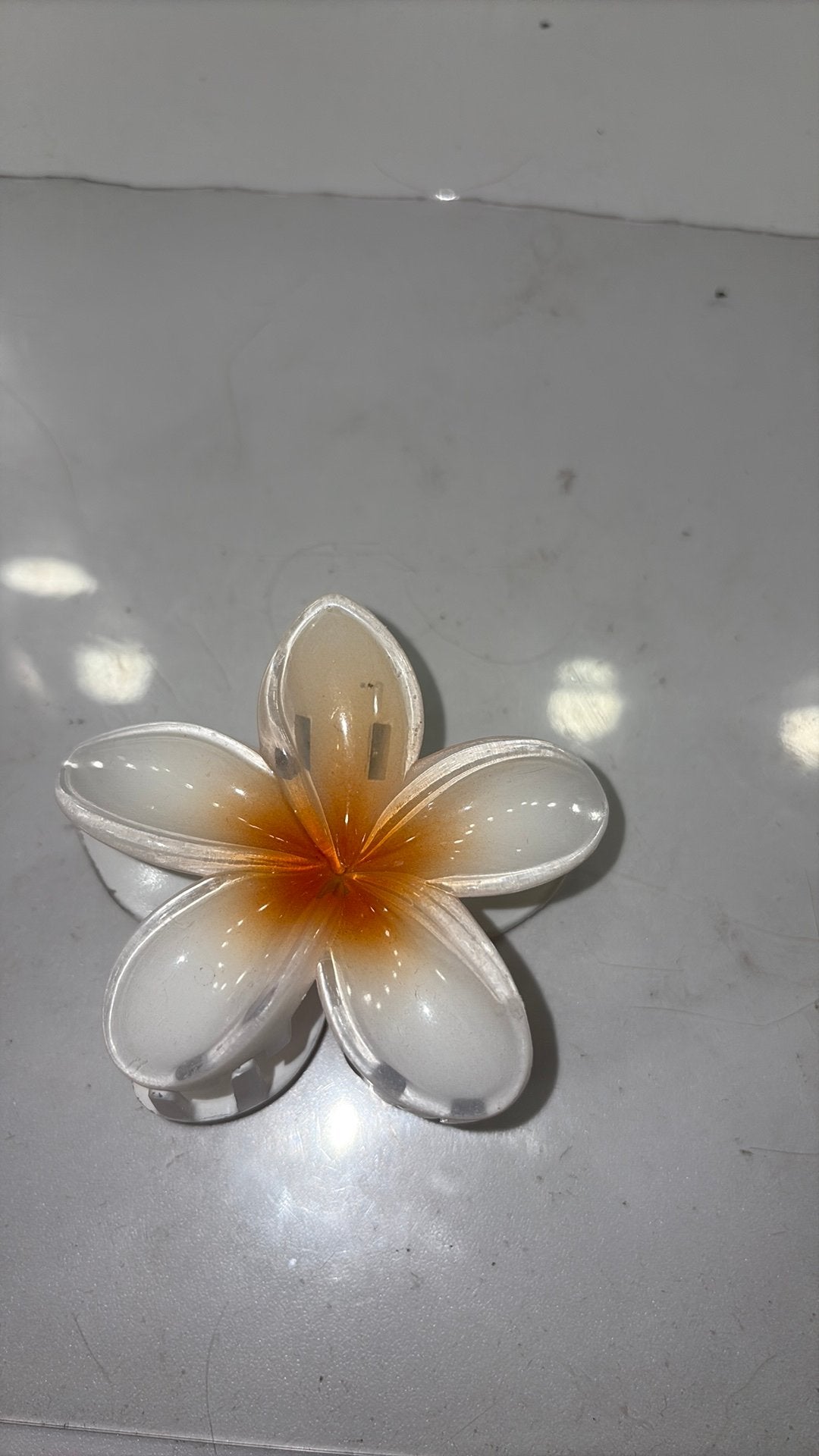 Een bloemen klem, Ophalen of Verzenden, Zo goed als nieuw, Goud, Overige materialen