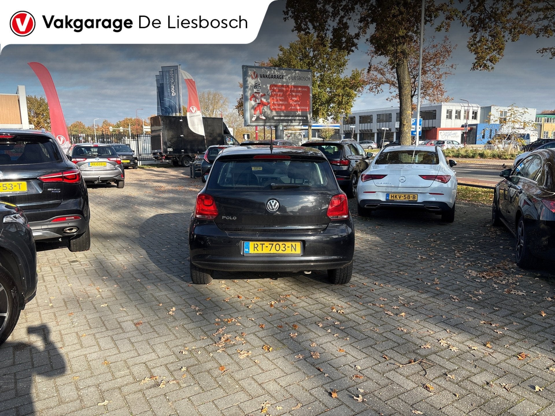 Volkswagen Polo 1.2-12V Comfortline/airco/navi/pdc/boeken/5, Auto's, Voorwielaandrijving, Euro 5, 1198 cc, Zwart