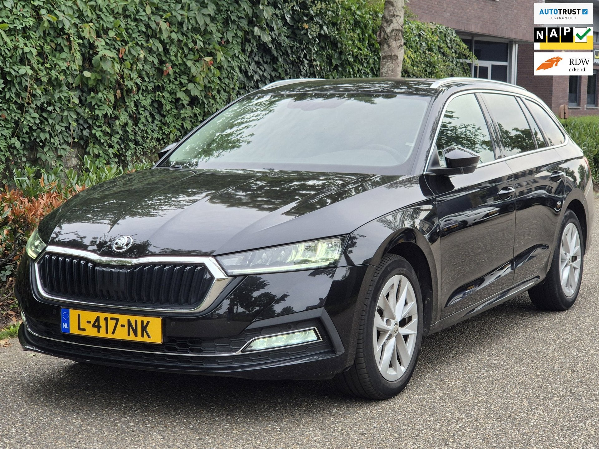 Skoda Octavia Combi e-TSI Business Edition Automaat CarPlay, Auto's, Dealer onderhouden, Stof, Gebruikt, Hybride Elektrisch/Benzine