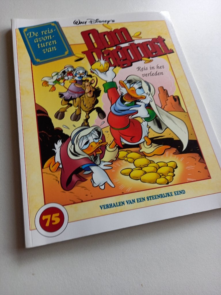 Deel 75: Reisavonturen van Oom Dagobert (1e druk), Boeken, Eén stripboek, Ophalen of Verzenden, Zo goed als nieuw