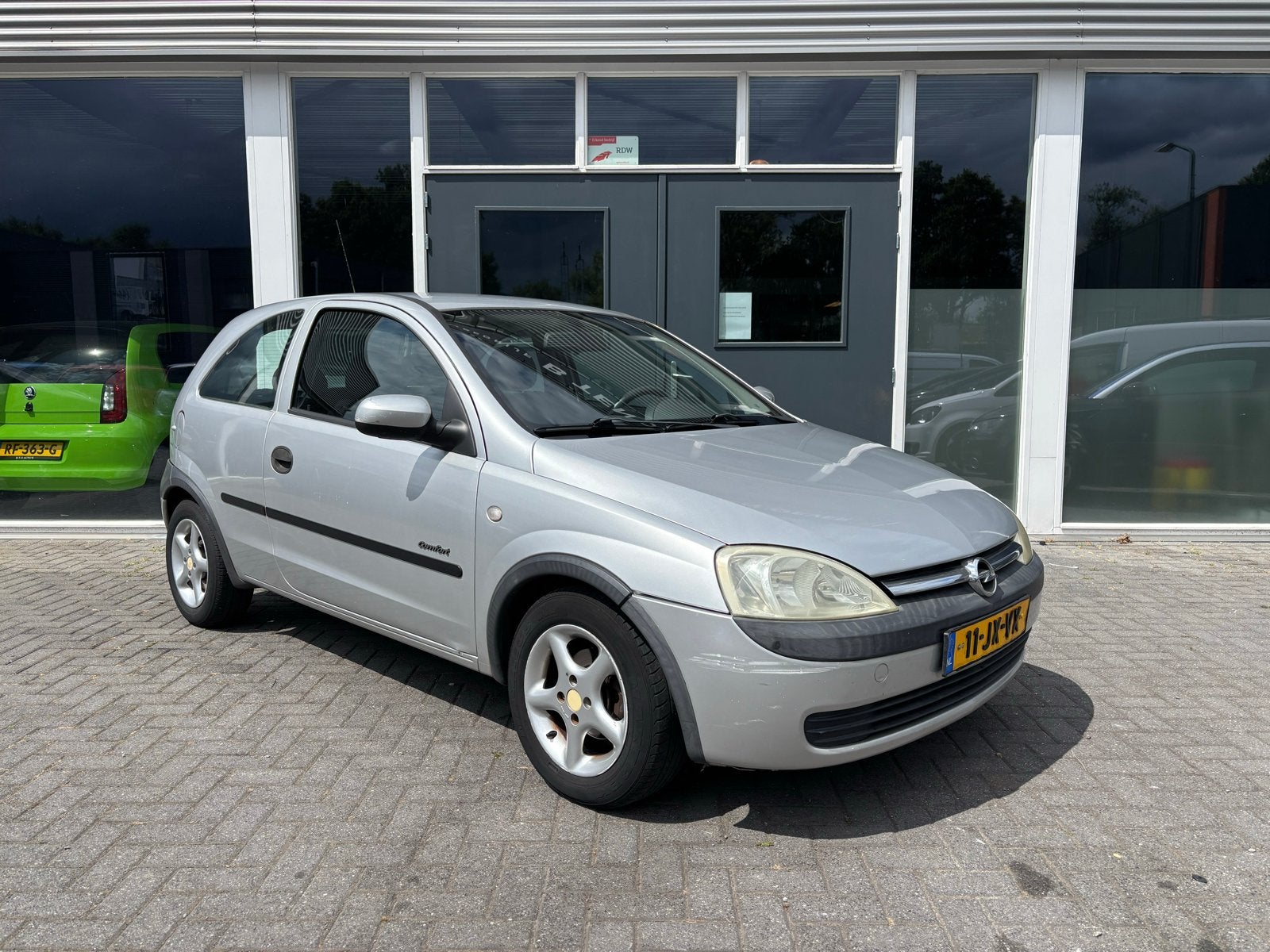 Opel Corsa 1.2 16V 3D 2002 Grijs A.P.K 22-02-2027, Voorwielaandrijving, 74 pk, Origineel Nederlands, Bedrijf