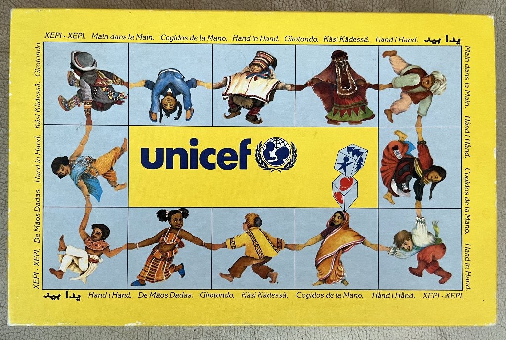 UNICEF hand in hand bordspel, Hobby en Vrije tijd, Drie of vier spelers, Ophalen of Verzenden, Zo goed als nieuw