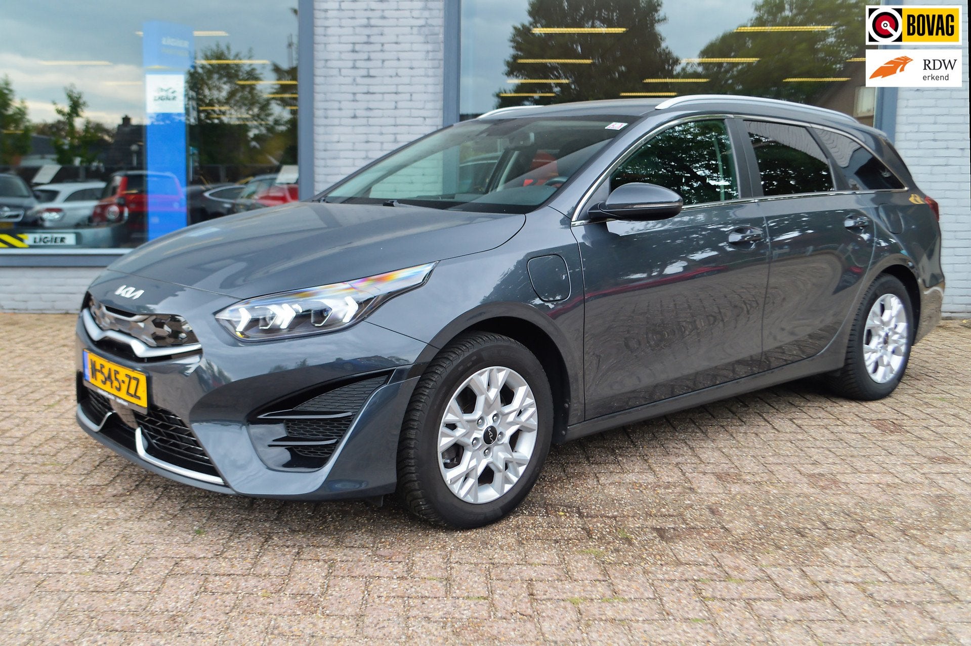 Kia Ceed Sportswagon 1.6 GDI PHEV DynamicPlusLine | Stuur en, Auto's, 8 kWh, 77 km/l, Gebruikt, Leder en Stof