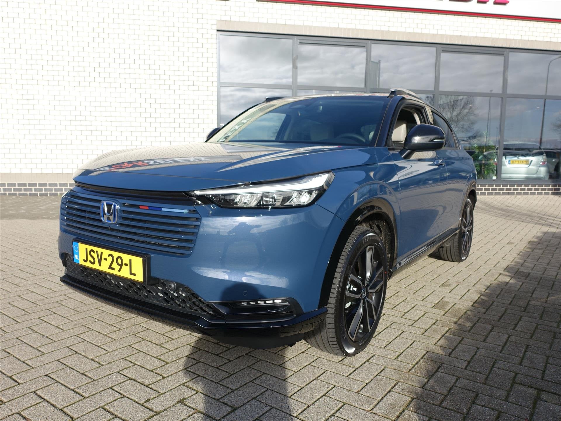 HONDA HR-V 1.5 e:HEV i-MMD 131pk CVT Advance Style Black Edi, Auto's, Euro 6, Blauw, Leder en Stof, Origineel Nederlands