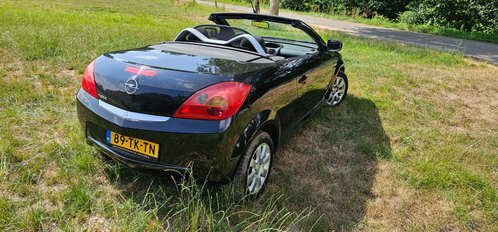Opel Tigra 1.4 16V Twintop 2006 Zwart, Auto's, Voorwielaandrijving, 4 cilinders, Cabriolet, Origineel Nederlands