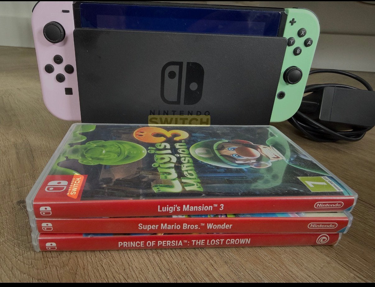 Nintendo Switch + 3 games + pastel paars/groen Joy-Cons, Spelcomputers en Games, Ophalen of Verzenden, Gebruikt, Met 1 controller
