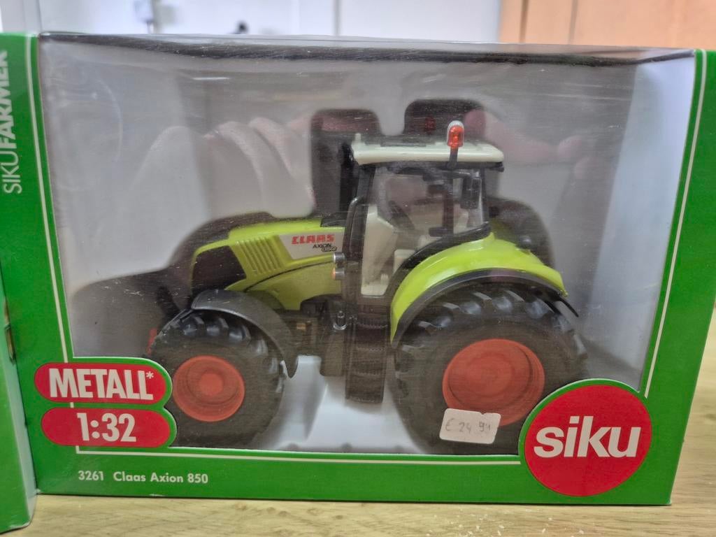 Siku Claas Axion 850 trekker met hooibalen aanhanger, Hobby en Vrije tijd, Modelauto's | 1:32, Ophalen of Verzenden, Nieuw, Tractor of Landbouw