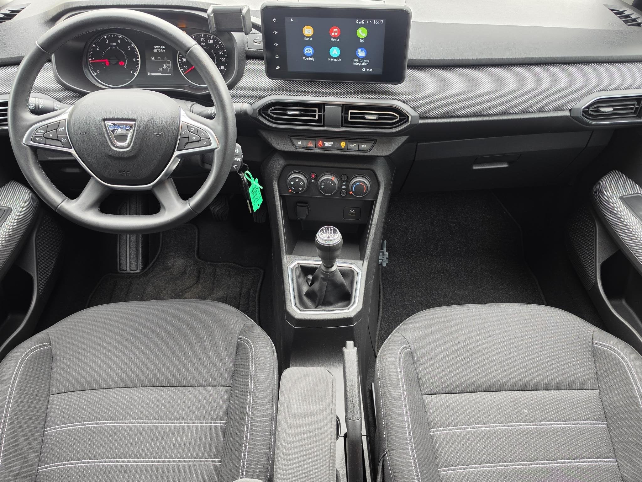 Dacia Sandero 1.0 Comfort / Dealer Onderhouden / 1e Eigenaar, Auto's, Stof, Gebruikt, Euro 6, Blauw