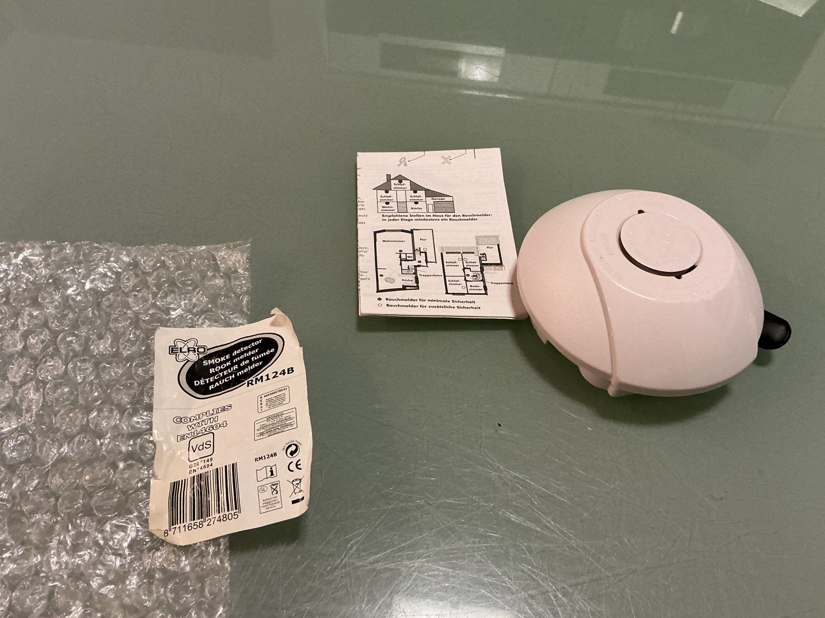 Nieuwe Elro RM124B brandmelder, Doe-het-zelf en Verbouw, Alarmsystemen, Ophalen of Verzenden, Zo goed als nieuw, Detector, Sensor of Melder