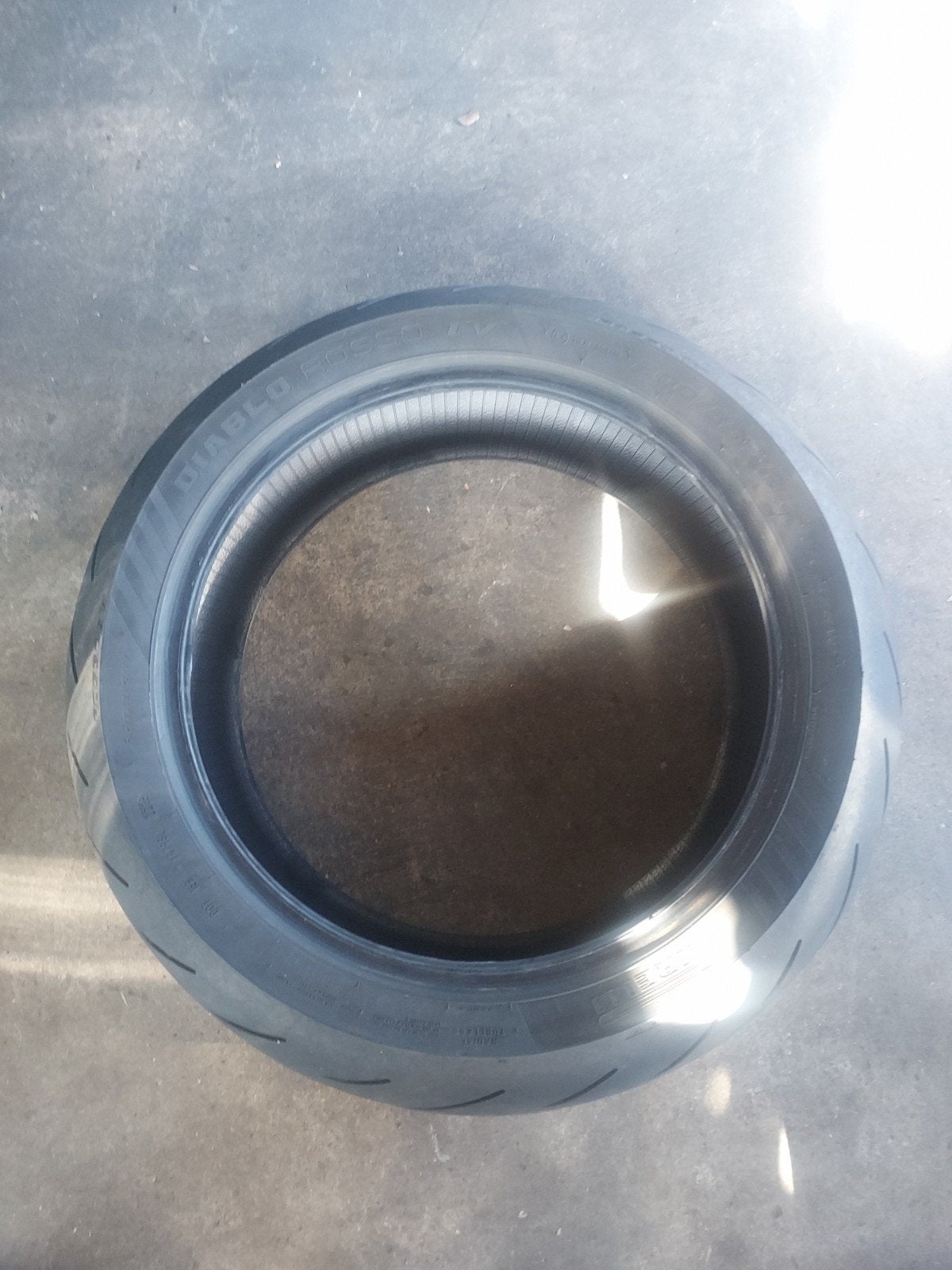 Pirelli Diablo Rosso 4 200/55-17 gebruikte motorband, Ophalen