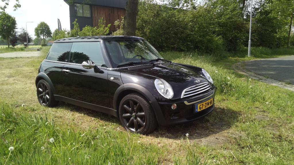 Mini One 1.6i bouwjaar 2006 sportieve Seven uitvoering, Auto's, Voorwielaandrijving, 4 cilinders, 4 stoelen, Zwart