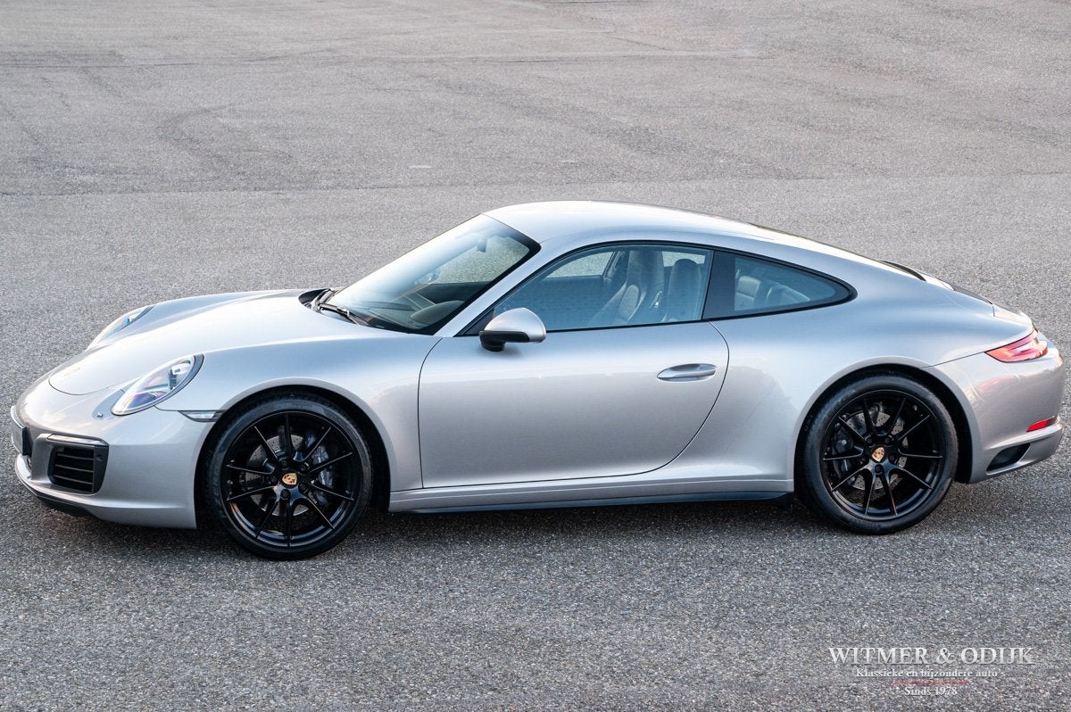 Porsche 911 3.0 Carrera 4 Wide-Body (bj 2017, automaat), Auto's, Dealer onderhouden, Gebruikt, Zwart, 4 stoelen