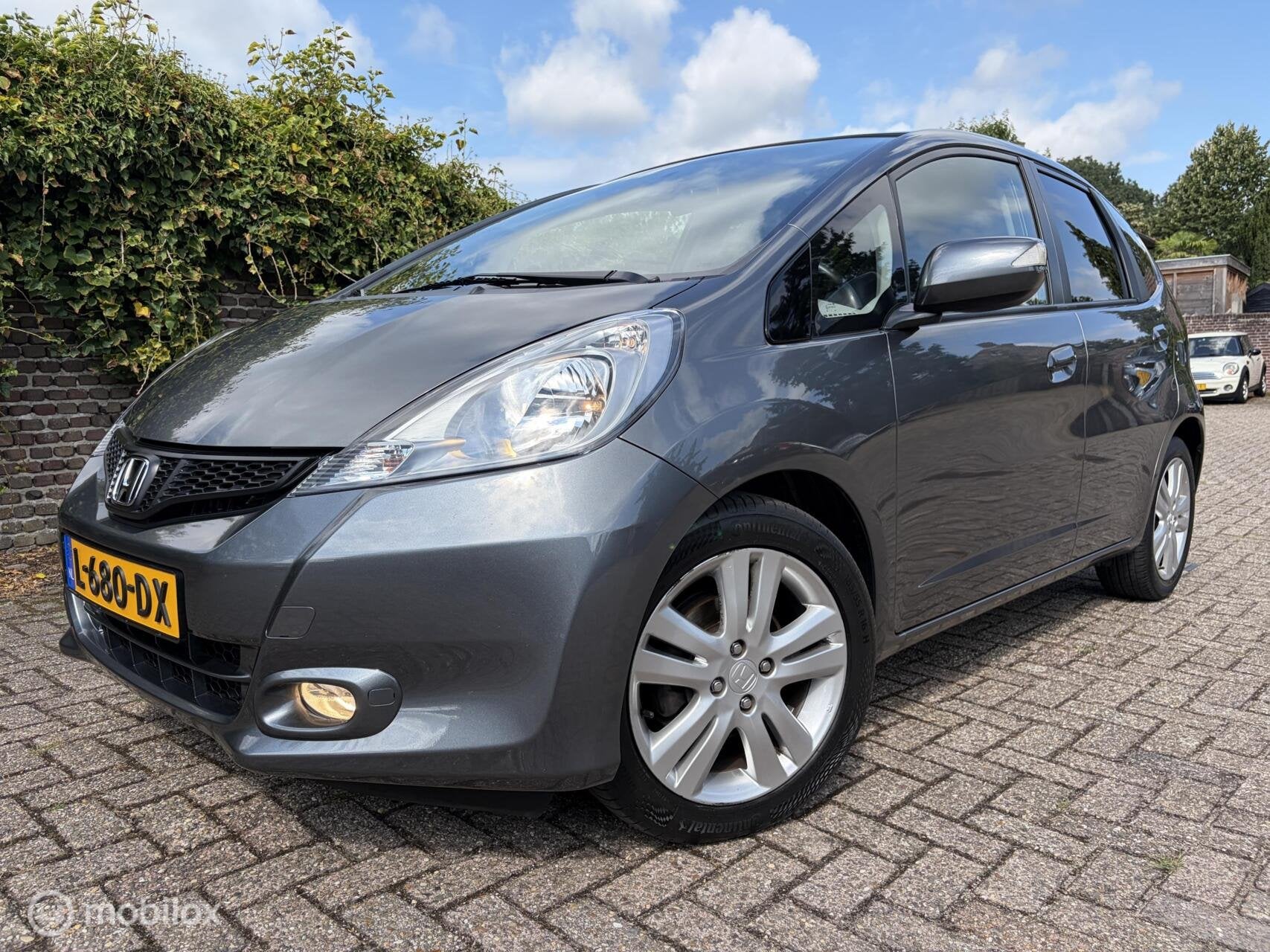 Honda Jazz 1.4 Elegance AUTOMAAT Climate control / APK 05-27, Auto's, Euro 5, Stof, Gebruikt, Zwart