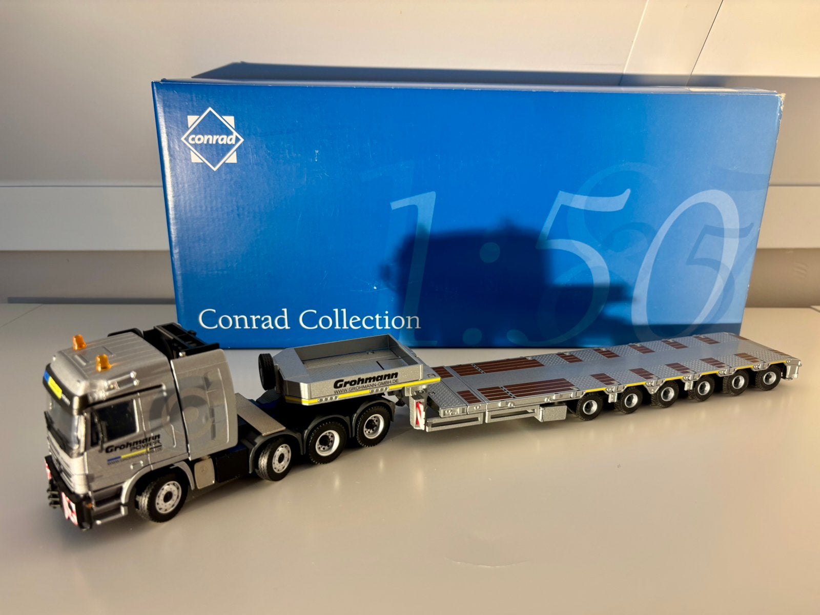 Conrad 40178 Mb Actros 8X4 + Goldhofer Stz-H6 Grohmann, Ophalen of Verzenden, Nieuw, Bus of Vrachtwagen, Conrad